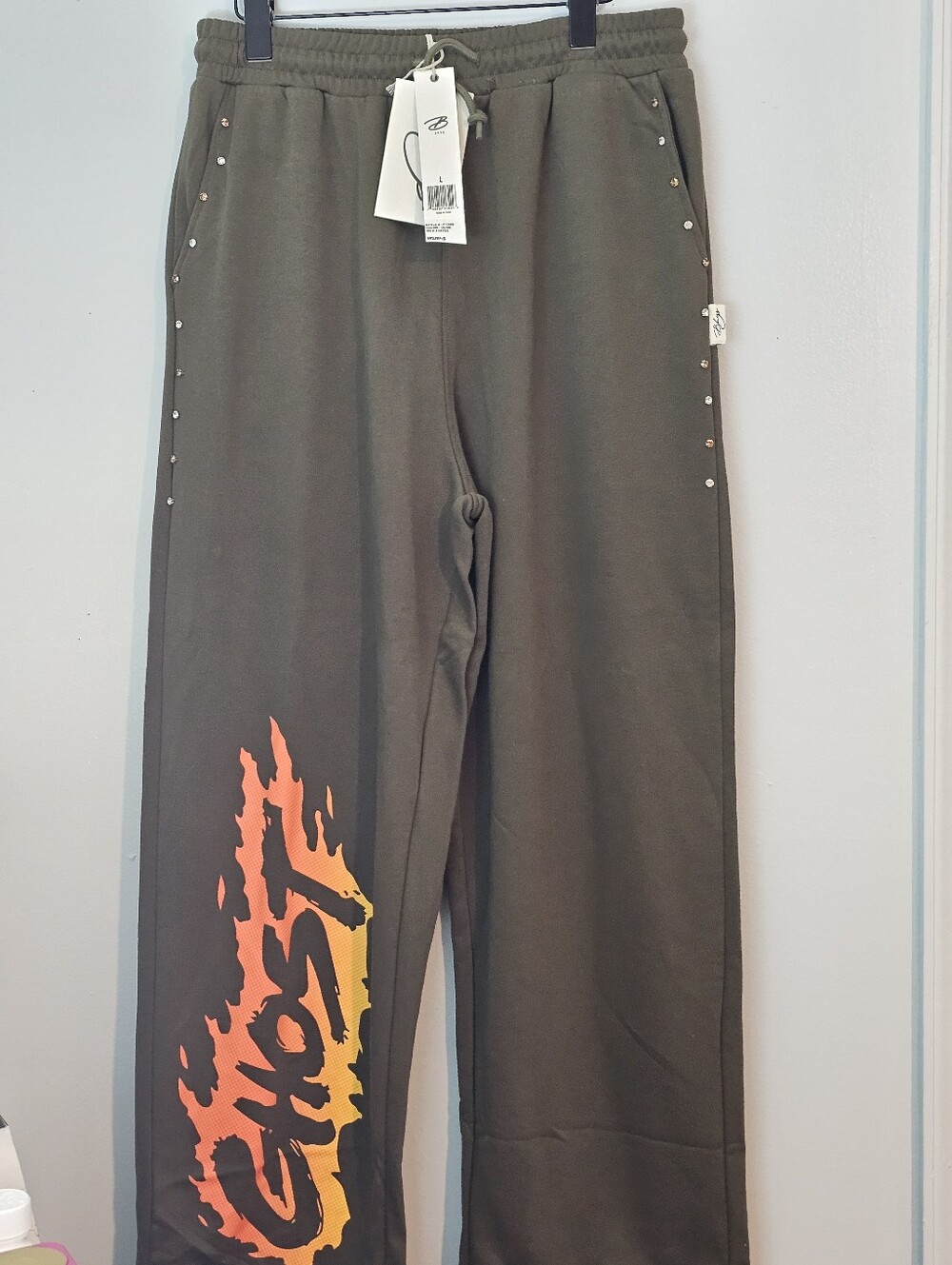 Blvs Olive Green Sweatpants with Orange Flame Ghost Graphic